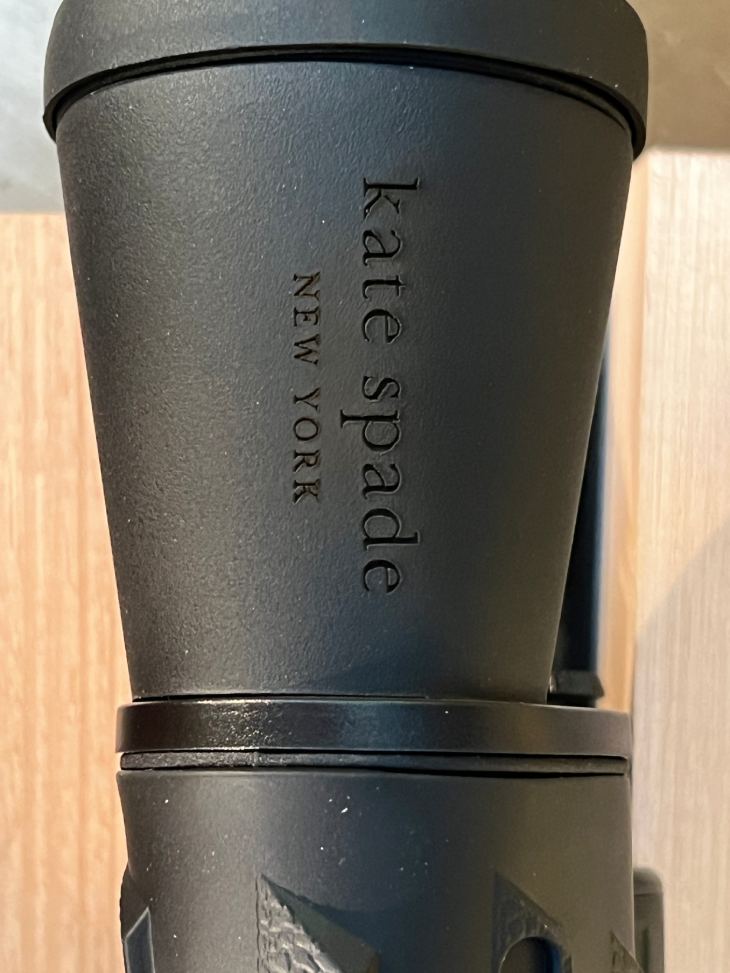 kate spade brand engraved on binoculars
