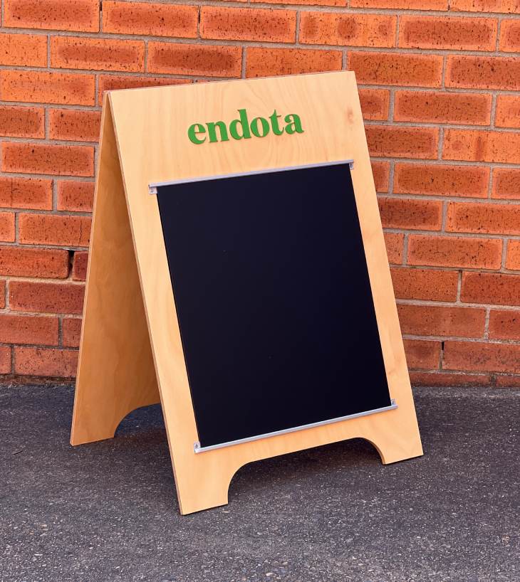 Endota Aframe sign with blackboard and aluminium runners above and below